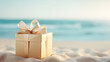 Golden gift box with a bow on a sandy beach near the ocean