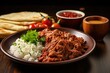Traditional Turkish and Arabic Ramadan dish with doner kebab tomato sauce rice on white plate wood table background