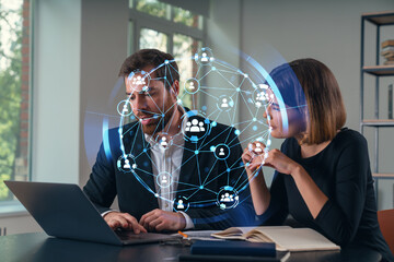 Wall Mural - thoughtful businesspeople typing on laptop at office workplace. concept of team work, business educa