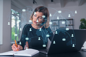 Wall Mural - pensive attractive beautiful businesswoman in formal wear working on laptop at office workplace in b