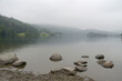 The shores of Grasmere in mist and drizzle in the Lake District