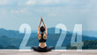 Happy new year start up 2024.  Yoga women lifestyle exercise and pose for healthy life. people balance body vital zen and meditation for workout on mountain morning nature background for success 2024