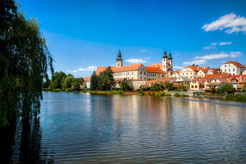 Sticker - View towards the Castle of Telc in the Czech Republic, with the Name of Jesus Church and the Tower of the Church of St James