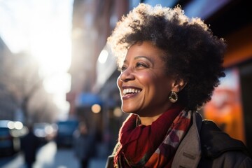 Canvas Print - Mature black woman smiling happy face on city street