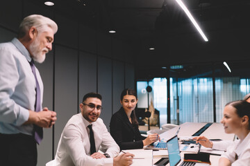 Wall Mural - Positive coworkers during business meeting in office