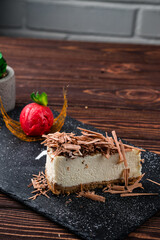 Canvas Print - Piece of vanilla cheesecake with chocolate, scoop of ice cream and mint, sweet dessert.