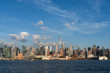 Fototapeta Nowy Jork - New York west side and panoramic view on skyline under sky with clouds sunset