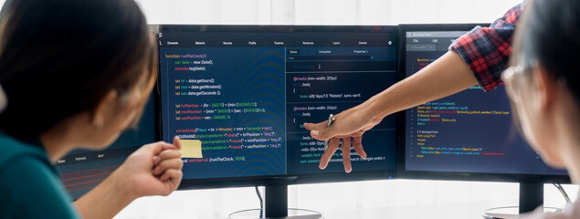 young professional website developer and cooperative computer engineer team brainstorming and sharin