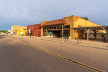 A Strip Of Old Bricks And Wooden Buildings Along A City Street, Quitaque, Texas