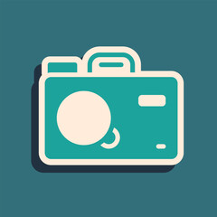 Poster - Green Photo camera icon isolated on green background. Foto camera. Digital photography. Long shadow style. Vector