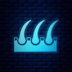 Sticker - Glowing neon Human hair follicle icon isolated on brick wall background. Hair care treatment. Vector