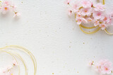 Fototapeta Nowy Jork - 白い和紙に桜と金の水引のフレーム