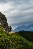 Fototapeta Dmuchawce - tourist on a mountain trail in the Tatra Mountains