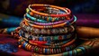 A stack of colorful bracelets sitting on top of a table