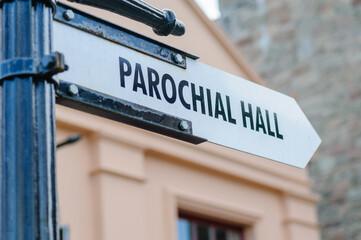 Street sign pointing to the Parochial Hall