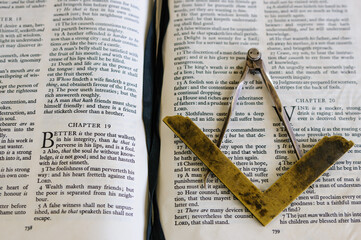Wall Mural - Compass and Set Square on a King James Version of the Bible in a junior blue Masonic Craft Room