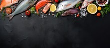 Assorted Fresh Raw Seafood On Black Slate Top View With Copy Space Copy Space Image Place For Adding Text Or Design