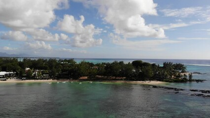 Canvas Print - View of tropical island with reefs and calm waves with sandy tourist beach in Grand-Baie, Mauritius