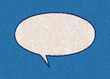 Empty white chat bubble on a background pattern of blue printing dots from a real vintage comic book page