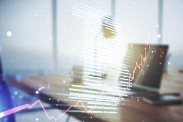 Poster - Double exposure of creative Bitcoin symbol with modern laptop on background. Cryptocurrency concept