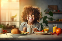 A Smiling Little Girl Having Breakfast In Kitchen