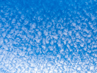 Wall Mural - abstract background with cirrus clouds on blue sky