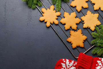 Wall Mural - Gingerbread cookies and fir tree branch