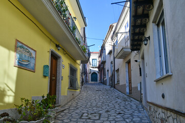 Naklejka na meble A narrow street among the old houses of Frigento, a town in Campania in Italy.