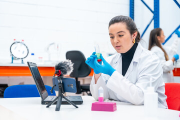 Wall Mural - scientist recording a video tutorial in a research laboratory