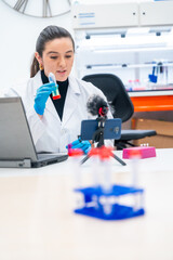 Wall Mural - scientist recording a scientific video podcast in a lab