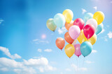 Fototapeta Nowy Jork - Colorful balloons floating on blue sky, background
