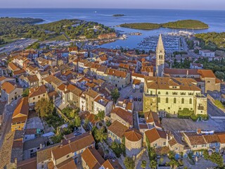 Panoramic drone picture of the Croatian harbor town of Vrsar on the Limski Fjord from the church bell tower