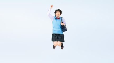 Aufkleber - ジャンプする制服を着た女子学生　切り抜き全身写真（切り抜き背景透過PNGも販売しております。作成者リンクから「PNG」で検索してください）