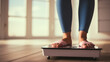 Womans feet weighing on scales. weight loss self car