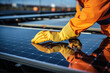 Close up of the hands of a male worker hands in gloves on solar panel, Technician installing solar panels.