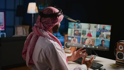 Poster - Remote Middle Eastern professional holding q and a session with webinar participants via video conference meeting. Muslim Internet video call host engaging in online discussions with trainees