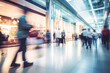 © VisualProduction - Blurred background of modern shopping mall with some shoppers. Shoppers walking at shopping center, motion blur. Blurred shoppers with shopping bags