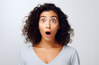 © lucky pics - Surprised Hispanic young adult woman on off-white background. Neural network generated photorealistic image.