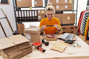 Sticker - Young blonde woman doctor smiling confident standing at office