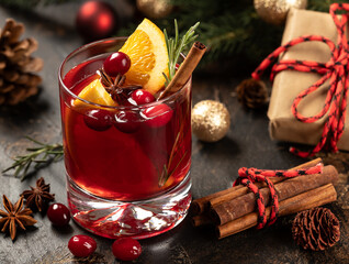 Wall Mural - Mulled red wine with Christmas decorations in background