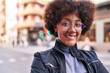 © Krakenimages.com - African american woman smiling confident standing at street