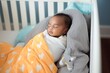 © Salsabila Ariadina - african Newborn baby is sleeping in a cute bedroom