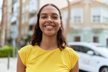 Sticker - Young african american woman smiling confident standing at street