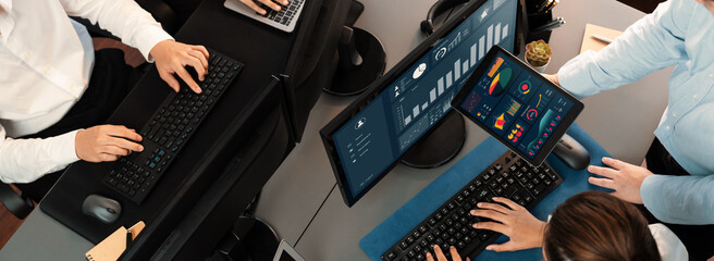 Poster - analyst working on data analysis or bi dashboard on computer monitor. business team analyzing financ