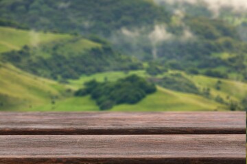 Sticker - Wood blank table top in outdoors nature background.