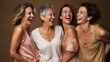 © CStock - Portrait of Female models of different ages laughing happily in the studio