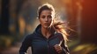 Health concept, young fitness woman runner running on trail with nature, woman and good health