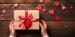 Teenage Valentine's Surprise - Capture the excitement as a teenager's hands eagerly open a Valentine's Day gift on a wooden background