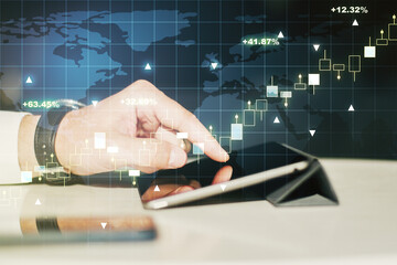 Aufkleber - Multi exposure of abstract creative financial graph with world map and finger presses on a digital tablet on background, forex and investment concept