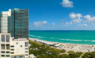 Canvas Print - View from above of american southern seashore of Miami Beach city. South Beach high luxurious hotels and apartment buildings. Tourist infrastructure in southern Florida, USA